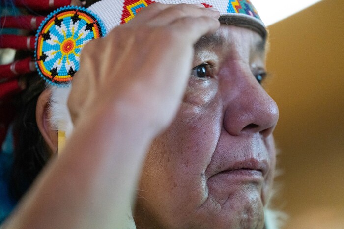 (Francisco Kjolseth | The Salt Lake Tribune) Ute elder Larry Cesspooch salutes the posting of the colors for the start of the 15th Annual Governor’s Native American Summit held on the Utah Valley University campus on Friday, Aug. 6, 2021.