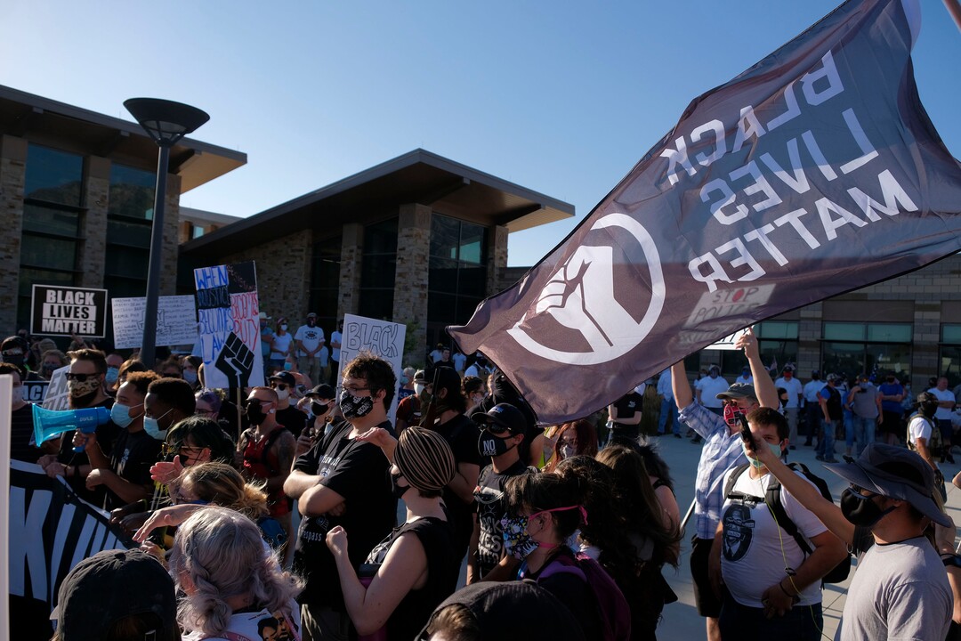 (Leah Hogsten  |  The Salt Lake Tribune) Five days after after nine protesters were arrested during a peaceful rally in memory of Zane James that turned into a violent clash with Cottonwood Heights officers, demonstrators gathered outside the police station Friday to denounce CHPD's actions and its officers for inciting the violence.