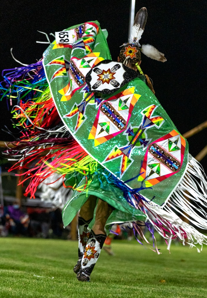 (Leah Hogsten | The Salt Lake Tribune Dancers are a whirl of regalia and color at the 41st Annual Paiute Indian Tribe of Utah Restoration Gathering, Aug. 13, 2021 in Cedar City, Utah.