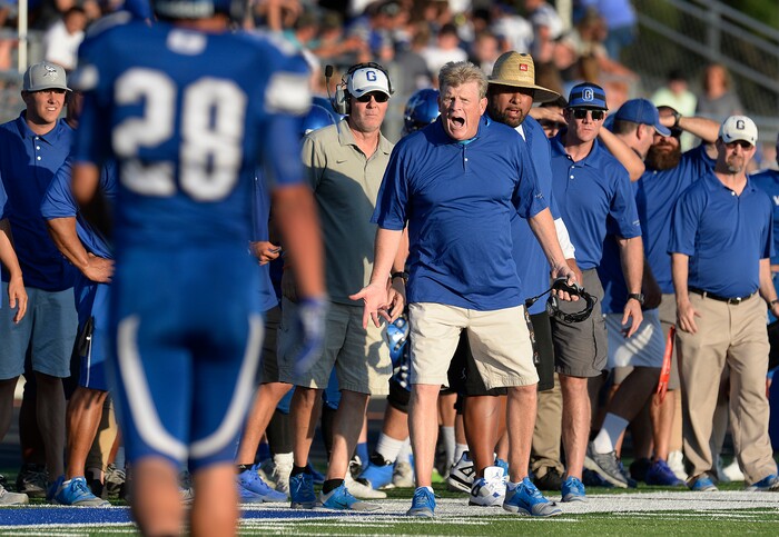 (Scott Sommerdorf | The Salt Lake Tribune) Pleasant Grove head coach Mark Wootton yells to officials whom he thought missed a call during first half play. Corner Canyon led Pleasant Grove 14-3 at the half, Friday, August 18, 2017.
