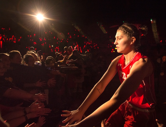 Rick Egan  |  The Salt Lake Tribune

Utah Utes forward Emily Potter (12) is introduced before the Utes faced the BYU Cougars. Potter had 21 points in the game, Saturday, December 10, 2016.