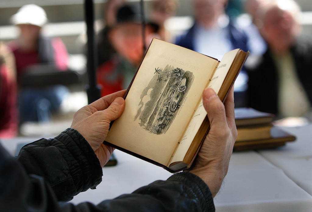 Scott Sommerdorf | The Salt Lake Tribune
Rare book dealer Tony Weller helps collector Kellie Wood with an assessment of her rare book during a rare book appraisal session at the 16th annual Book Festival, sponsored by the Utah Humanities Council. The event is a two-day outdoor festival taking place on Library Square Saturday and Sunday that includes authors, music, book arts, a poetry slam, writing activities and more, Saturday, September 28, 2013.