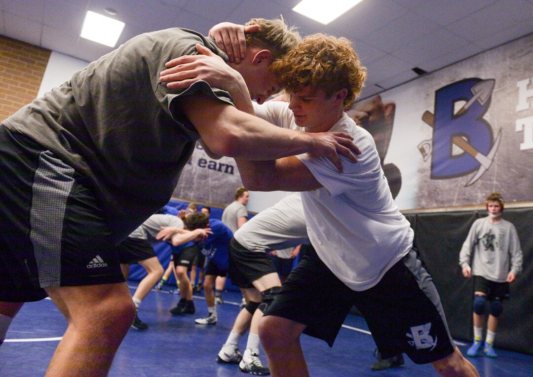 (Leah Hogsten  |  The Salt Lake Tribune)  Bingham High School wrestler Cole Moody, (right) Utah's reigning state champion, spars with teammate Mason Chirstiansen after school Friday, February 2, 2018.