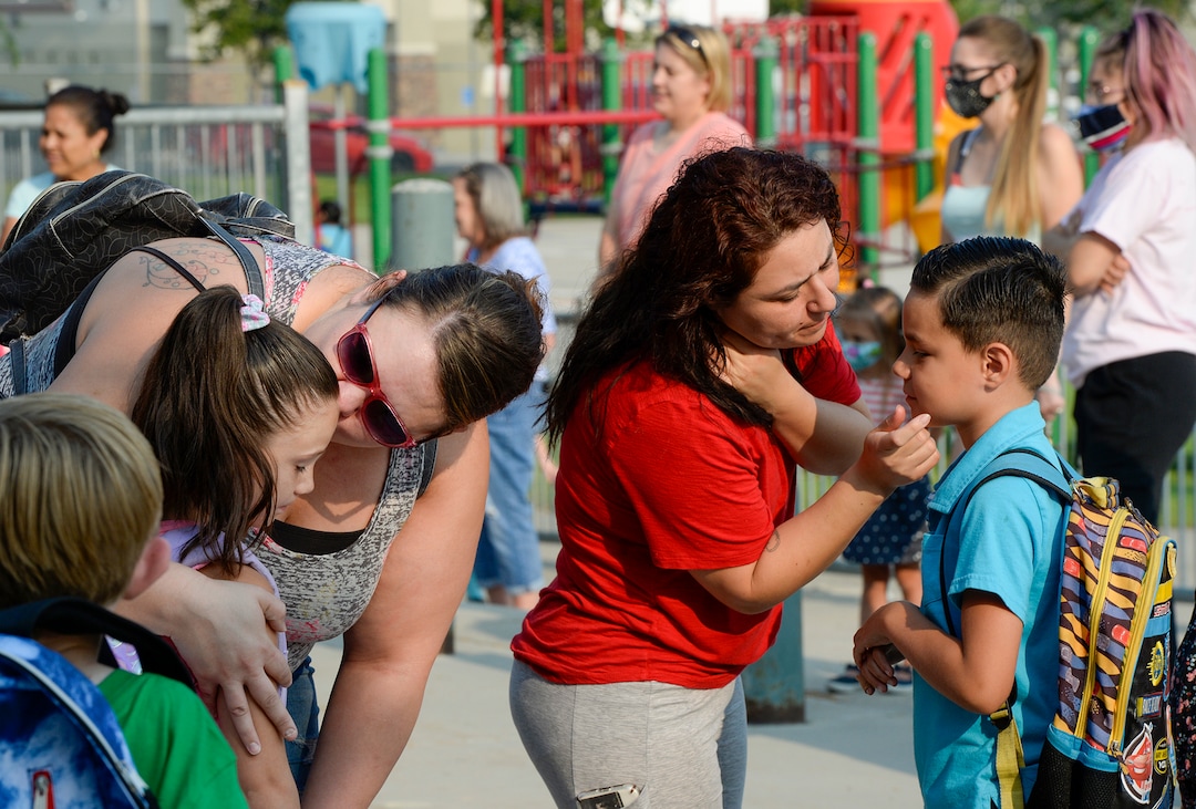 (Chris Samuels | The Salt Lake Tribune) Parents say goodbye to students as they begin the first day of school at Whittier Elementary in West Valley City, Monday, Aug. 16, 2021.