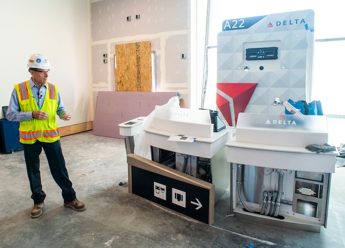 (Rick Egan  |  The Salt Lake Tribune)       Mike Williams, the new Salt Lake City program director points out a model of what the new Delta gates will look like during a tour of the new Airport. In less than a year the Salt Lake City Department of Airports will open the first phase of the new Salt Lake International Airport, Monday, Sept. 23, 2019.