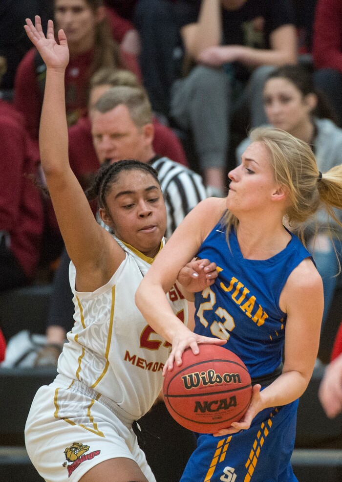 (Rick Egan  |  The Salt Lake Tribune)   Judge Memorial guard Miyalla Tarver (24), guards Ryan Shumway (30) San Juan, in 3A Women's basketball State playoff action Judge Memorial vs. San Juan, in Heber City, Friday, Feb. 16, 2018.