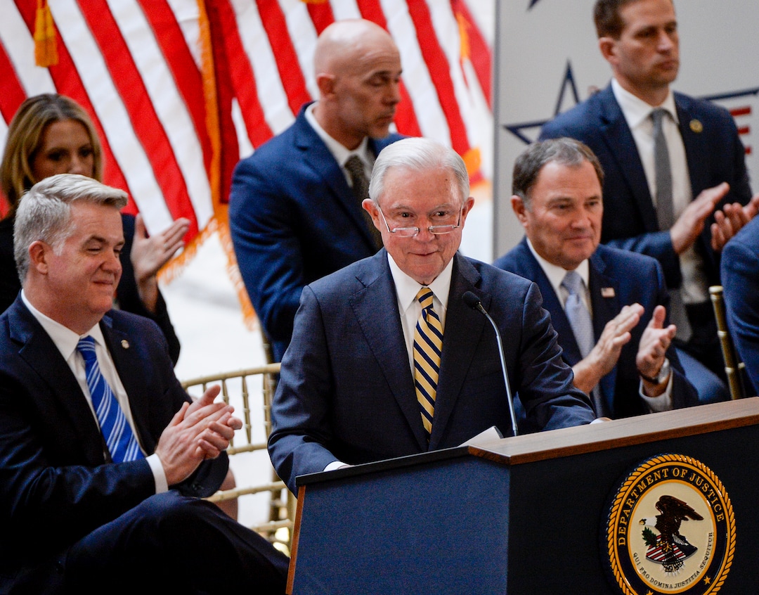 Leah Hogsten  |  The Salt Lake Tribune   U.S. Attorney General Jeff Sessions touted Project Safe Neighborhoods, Wednesday, October 3, 2018, at the Utah Capitol, on the one year anniversary since the Trump administration returned to the policy pushed by the George W. Bush administration. Under Project Safe Neighborhoods, federal prosecutors focus on security stiff sentences for those convicted of gun crimes and reducing violent crimes.