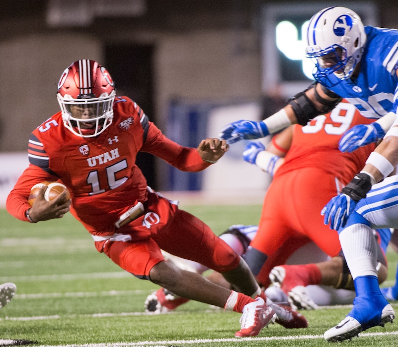 (Rick Egan  |  The Salt Lake Tribune)        Utah Utes quarterback Jason Shelley (15) runs with the ball, in football action between the Brigham Young Cougars and the Utah Utes, at Rice-Eccles Stadium, Saturday, November 24, 2018.