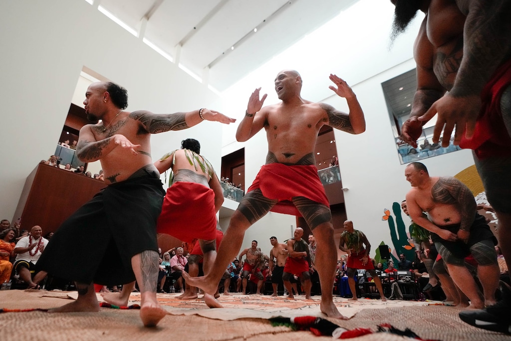 (Francisco Kjolseth | The Salt Lake Tribune) Utah’s Pacific Islander community celebrates the opening of the ‘Tatau’ exhibition at the Utah Museum of Fine Arts on Saturday, Aug. 12, 2023, as men dance in the great hall to a packed crowd. 