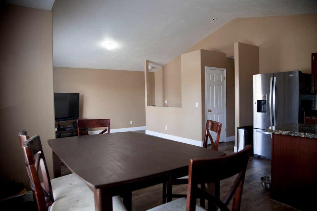 (Stella Yu |  The Salt Lake Tribune) This 2,252-square-foot rambler home in Tooele comes with four bedrooms, three baths, a family room, a kitchen with a bar. The backyard provides room for RV parking, with garden beds on the side yard. 