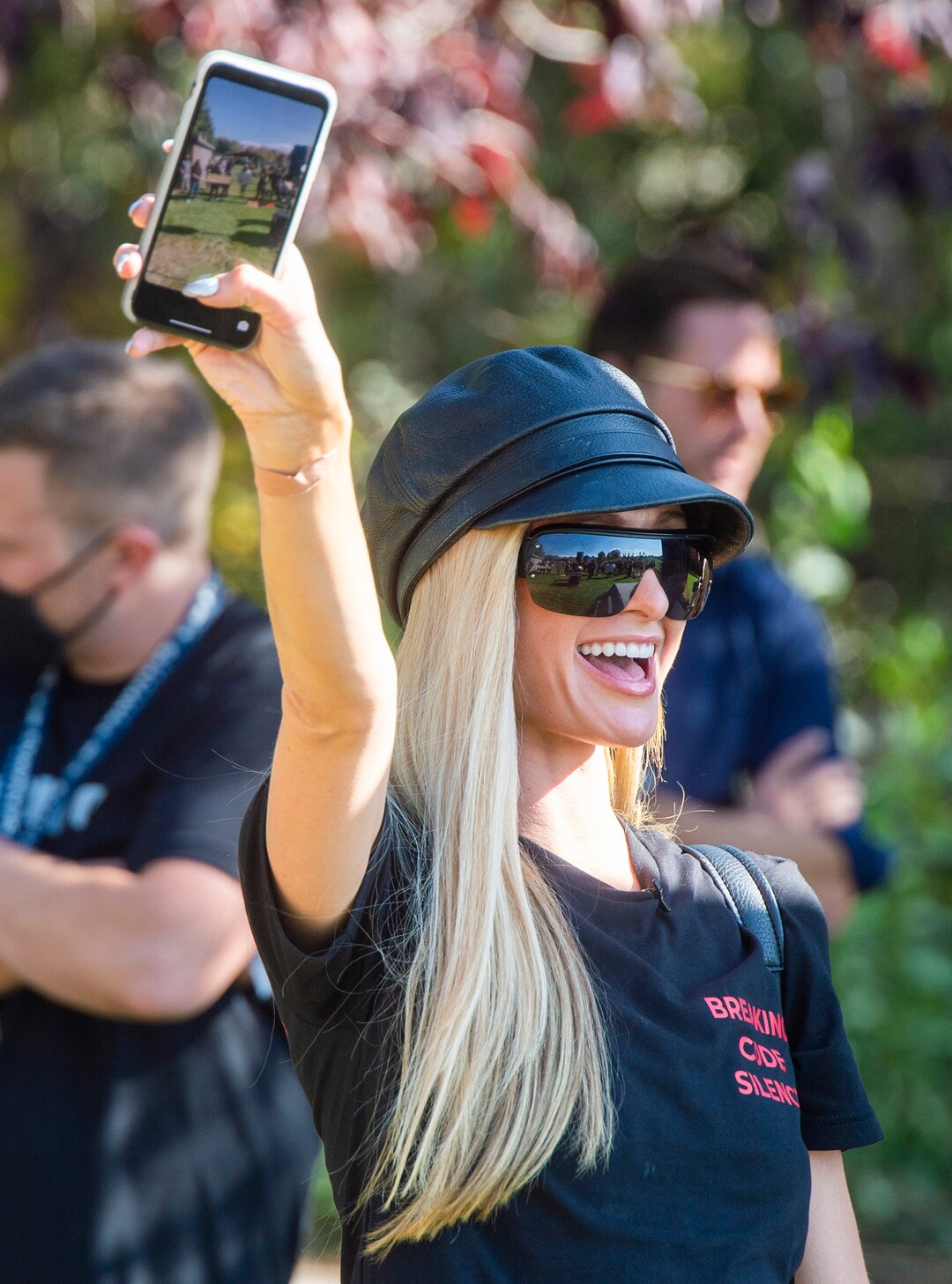 (Rick Egan  |  The Salt Lake Tribune)   Paris Hilton films the survivors during a rally calling for the closure of Provo Canyon School, a residential treatment center in Utah she attended when she was a teen, on Friday, Oct. 9, 2020.