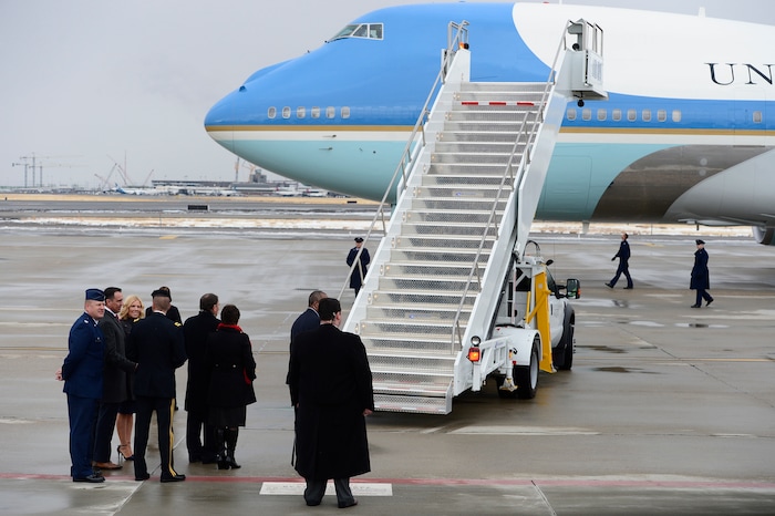 (Scott Sommerdorf   |  The Salt Lake Tribune)   Governor Gary Herbert and his wife, Speaker Greg Hughes and his wife, wait for President Trump to deplane after the arrival of Air Force One at the Ronald R Wright National Air Guard Base, Monday, December 4, 2017.  
