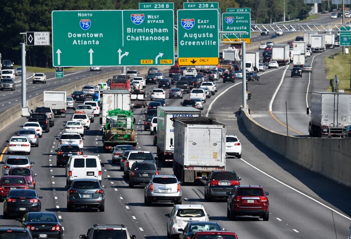(Mike Stewart | The Associated Press) Heavy traffic traveling north bound on Interstate 75 moves slowly, as a major evacuation has begun in preparation for Hurricane Irma, Friday, Sept. 8, 2017, in Forrest Park, south of Atlanta.