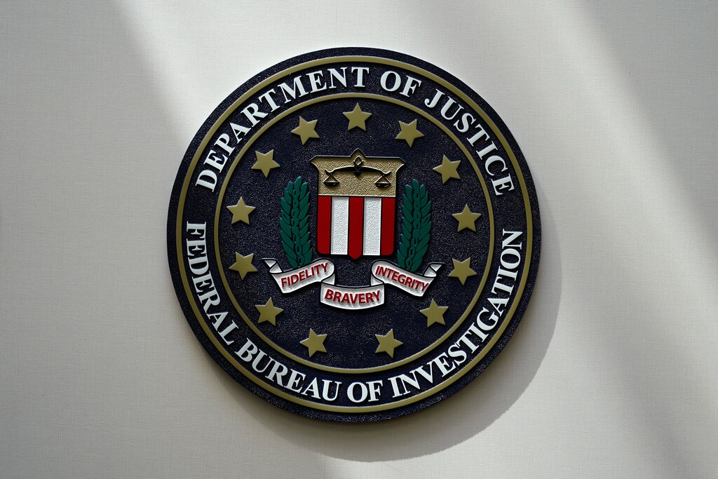 (Charlie Neibergall | The Associated Press) The FBI seal is pictured in Omaha, Neb., Aug. 10, 2022. A Utah man has been charged with threatening a Palestinian rights organization in Washington. The case was unsealed Monday, Nov. 20, 2023, as tensions rise in the U.S. from the devastating war between Israel and Hamas.