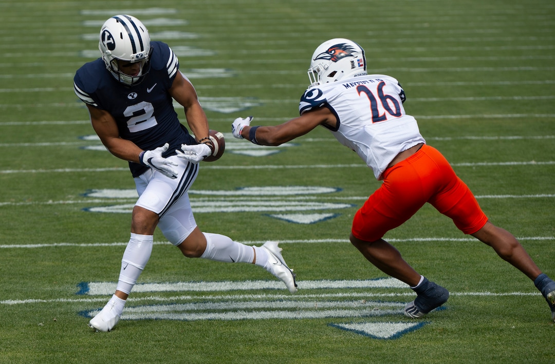(Rick Egan  |  The Salt Lake Tribune)    Brigham Young Cougars wide receiver Neil Pau'u (2) has the ball stripped by UTSA Roadrunners cornerback Corey Mayfield Jr. (26), resulting in a fumble, in football action between the Brigham Young Cougars and the UTSA Roadrunners, at Lavell Edwards stadium, Saturday, Oct. 10, 2020.