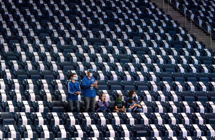 (Rick Egan | The Salt Lake Tribune)  Socially distanced fans cheer for the Cougars, in basketball action at the Marriott Center in Provo, on Saturday, Jan. 30, 2021.
