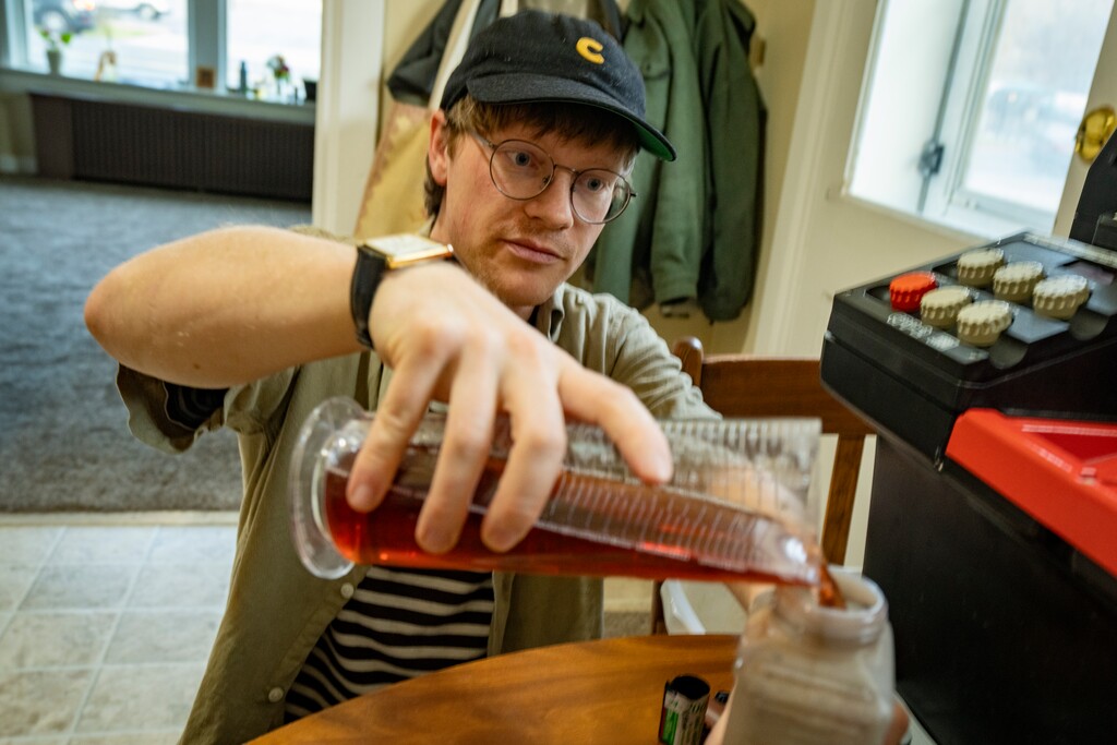 (Rick Egan | The Salt Lake Tribune) Jason Haywood pours chemicals at  his kitchen table in Logan on Wednesday, March 4, 2026.
