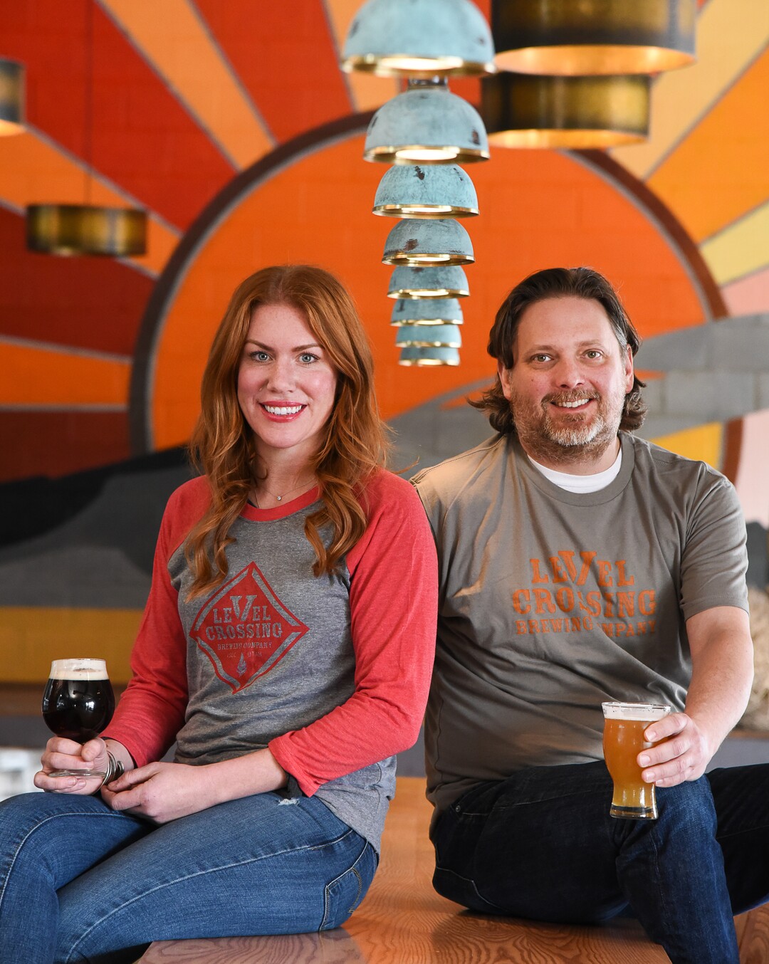 (Francisco Kjolseth  |  The Salt Lake Tribune)  Katie Flanagan, sales and marketing manager and Mark Medura, owner, of Level Crossing Brewing Co. in South Salt Lake.
