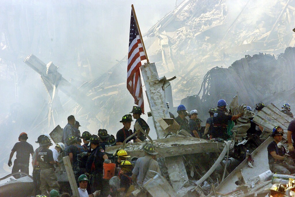 (Beth A. Keiser | AP photo)

In this Sept. 13, 2001, file photo, an American flag flies over the rubble of the collapsed World Trade Center buildings in New York.