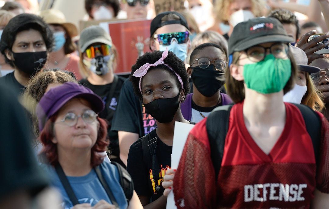 (Francisco Kjolseth  |  The Salt Lake Tribune) Demonstrators protest against police brutality at the Salt Lake City Public Safety Building on Wednesday, June 3, 2020, as the initially set 8 p.m. weeklong curfew was removed.