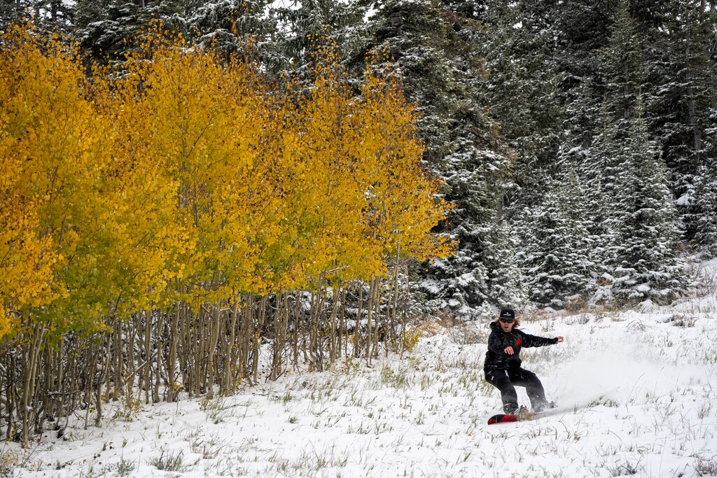 (Jessee Lynch/Brian Head Resort) Jeremy Sorensen takes his snowboard for a ride at Brian Head Resort near Cedar City after a storm dropped 5 inches there Monday, Oct. 2, 2023. Brian Head has expectations of becoming the first Utah ski area to open for the second season in a row. It has set Nov. 10 as its anticipated opening date.