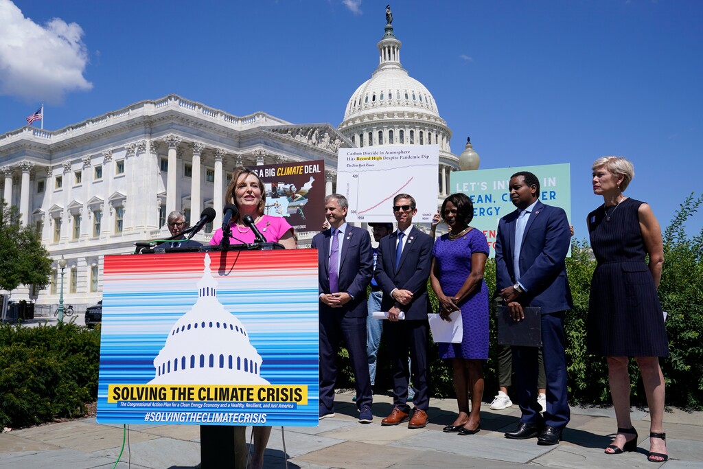 Rep. Kathy Castor, D-Fla., left, speaks about the climate crisis and the Inflation Reduction Act during a news conference on Capitol Hill in Washington, Friday, Aug. 12, 2022. (AP Photo | Susan Walsh)