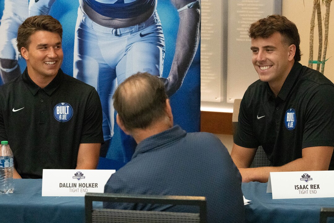 (Francisco Kjolseth | The Salt Lake Tribune) Tight end Dallin Holker busts up during a print media interview as BYU football coaches, players and staff participate in BYU football media day in the BYU Broadcasting Building in Provo on Thursday, June 17, 2021.