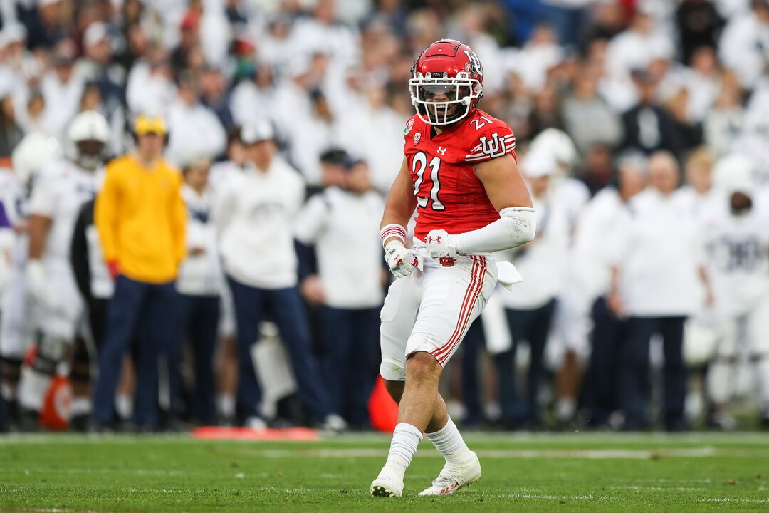 (Meg Oliphant | Special to The Tribune) Utah linebacker Karene Reid (21) celebrates his sack of Sean Clifford #14 of the Penn State Nittany Lions in the second quarter at Rose Bowl Stadium on Jan. 2, 2023 in Pasadena, California.