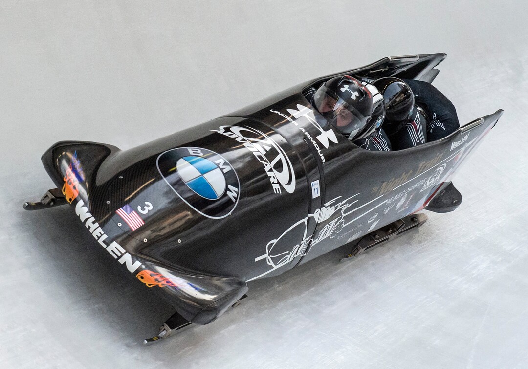 Steven Holcomb of the USA and his team compete during the four-man bobsled competition at the Bob and Skeleton World Championships in Winterberg, Germany, Sunday, March 8, 2015. (AP Photo/Jens Meyer)
