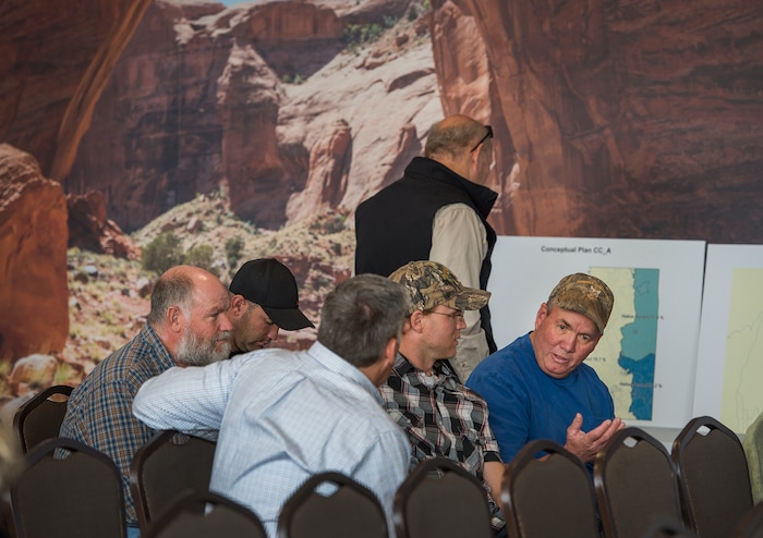 (Leah Hogsten  |  The Salt Lake Tribune) Lloyd Nielson, right talks with San Juan County Commissioner Phil Lyman, left, and fellow residents worried about the new divisions in Blanding on the proposed district maps.  San Juan County residents were presented with proposals of the newly redrawn county commission and school board districts during hearings in Monticello and Bluff, November 16, 2017. The redistricting proposals would redraw voting districts to ensure significant American Indian majorities in two of three County Commission districts and on four of five school board voting districts as the result of a January 2012 lawsuit filed in U.S. District Court by the Navajo Nation. The lawsuit seeks the redrawing of voting districts to reflect the 2010 U.S. Census. Last year, U. S. District Court Judge Robert Shelby ruled the voting districts in the sprawling southeastern Utah county, which today is home to 16,895 residents, are unconstitutional and violate the rights of American Indians. He ordered the county to redraw them.
