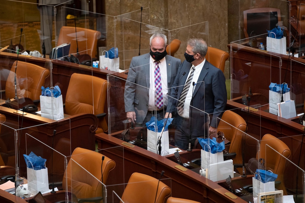 (Francisco Kjolseth | The Salt Lake Tribune) Members of the House of Representatives are partitioned by plexiglass as the Utah State Legislature opens the 2021 legislative session at the Capitol in Salt Lake City on Tuesday, Jan. 19, 2021. The plexiglass partitions on the House floor to prevent the spread of COVID-19 can be removed if legislators request it.