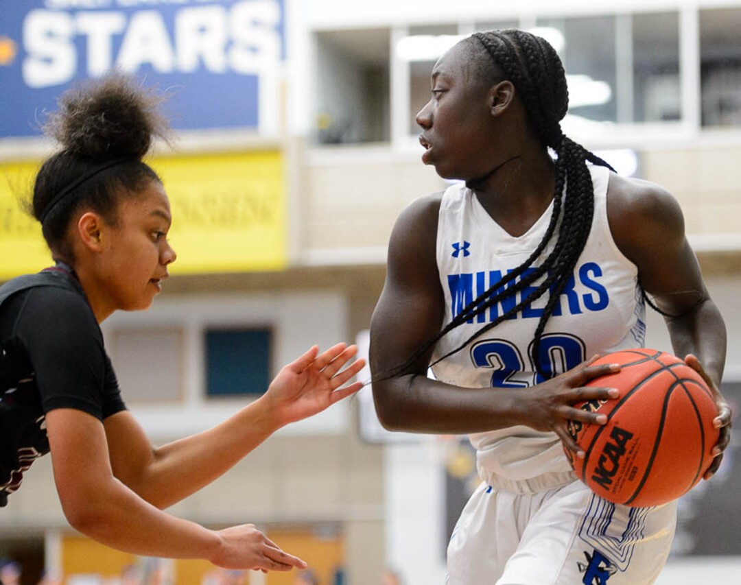 (Trent Nelson | The Salt Lake Tribune)  Bingham's Shanyce Makuei (20) defended by Northridge's Michaela Harris (10) as Bingham faces Northridge in the 6A High School Girls' Basketball Tournament at SLCC in Taylorsville, Thursday Feb. 22, 2018.