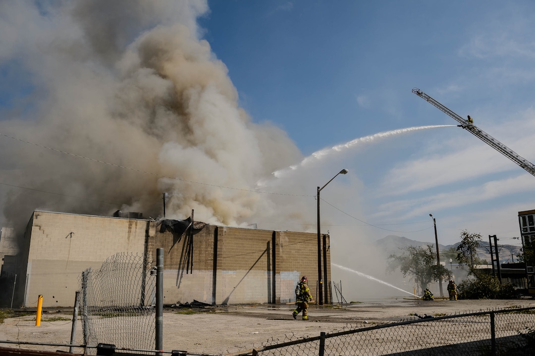 (Trent Nelson  |  The Salt Lake Tribune) Crews work to extinguish a fire at 800 South 200 West in Salt Lake City on Wednesday, Sept. 9, 2020.