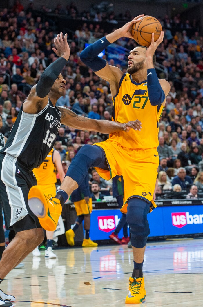 (Rick Egan  |  The Salt Lake Tribune)    
Utah center Rudy Gobert (27) takes the ball up the middle as San Antonio Spurs forward LaMarcus Aldridge (12) defends, in NBA action between the Utah Jazz and the San Antonio Spurs, in Salt Lake City, Friday, Feb. 21, 2020.