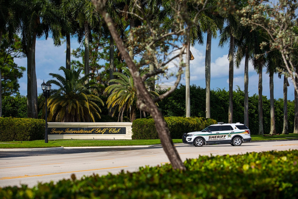 (Saul Martinez | The New York Times) Police outside Trump International Golf Club in West Palm Beach, Fla., on Sunday, Sept. 15, 2024. A shooting took place on the grounds of the Trump International Golf Course West Palm Beach on Sunday while former President Donald Trump was at the course, the Palm Beach County Sheriff's Office said. Officials said that Trump was safe.
