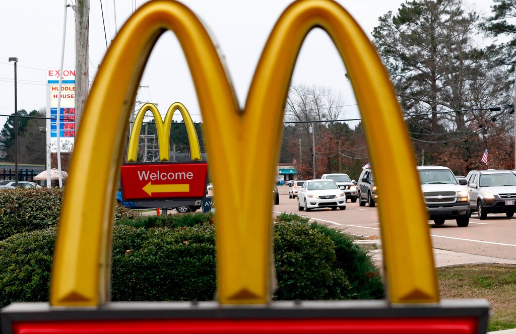 (Rogelio V. Solis | The Associated Press) This Feb. 15, 2018, file photo shows a McDonald's Restaurant in Brandon, Miss. Seven national fast-food chains have agreed to end policies that block workers from changing branches, limiting their wages and job opportunities, under the threat of legal action from the state of Washington. Washington Attorney General Bob Ferguson announced the binding agreements with companies including Arby’s, Jimmy John’s and Cinnabon, at a news conference Thursday, July 12, 2018. McDonald's also signed on, but previously announced plans to end the practice.