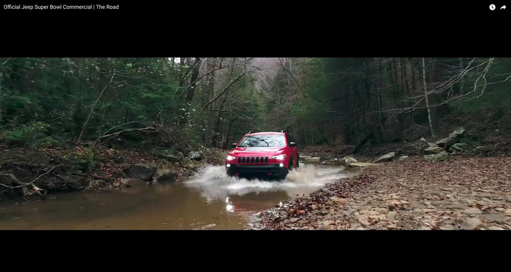 (Fiat Chrysler Automobiles | The Associated Press) This image made video obtained from the Jeep brand YouTube channel of Fiat Chrysler Automobiles shows part of its commercial video aired during the Super Bowl on Sunday, Feb. 4, 2018. The head of one of the nation's largest fish conservation groups says Fiat Chrysler Super Bowl ads "glorified" the destruction of aquatic habitat in an apparent attempt to appeal to off-road thrill seekers.