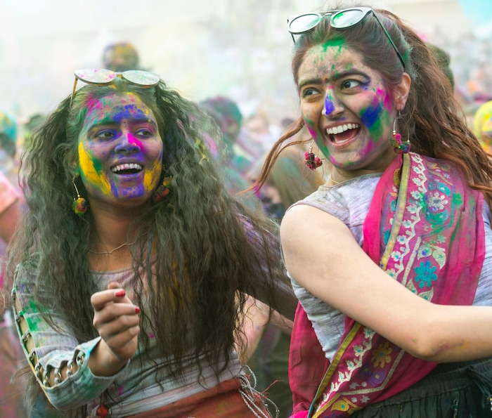 (Rick Egan  |  The Salt Lake Tribune)   Kajal San and Hira Hamid dance along with the Bollypop Utah dancers, at the Holi Festival of Colors celebration at the Sri Sri Radha Krishna Temple in Spanish Fork, Saturday, March 30, 2019.