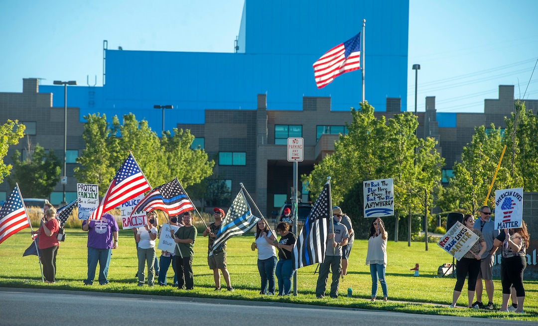(Rick Egan  |  The Salt Lake Tribune)     Police supporters upset by a Pat Bagley cartoon, protest The Salt Lake Tribune in West Valley City, on Thursday, Sept. 3, 2020.
