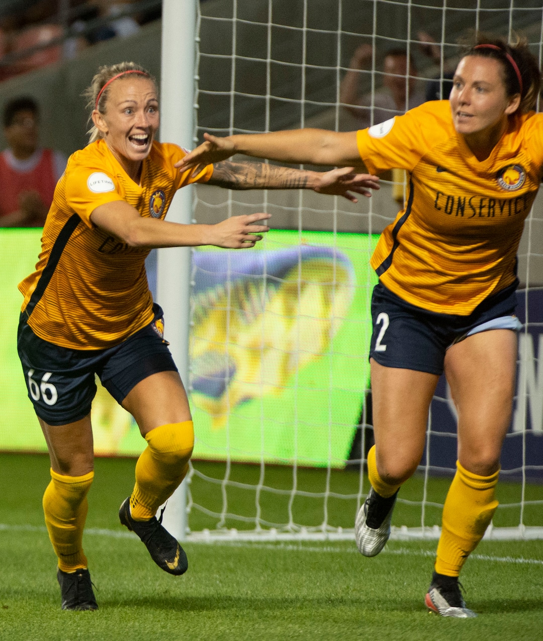 (Rick Egan  |  The Salt Lake Tribune)    Utah Royals FC midfielder Gunnhildur Jónsdóttir (66) celebrates after Utah Royals FC defender Rachel Corsie (2) scored the game tying goal, in Soccer action between Utah Royals FC and Portland Thorns FC, in Sandy, Friday, July 19, 2019.