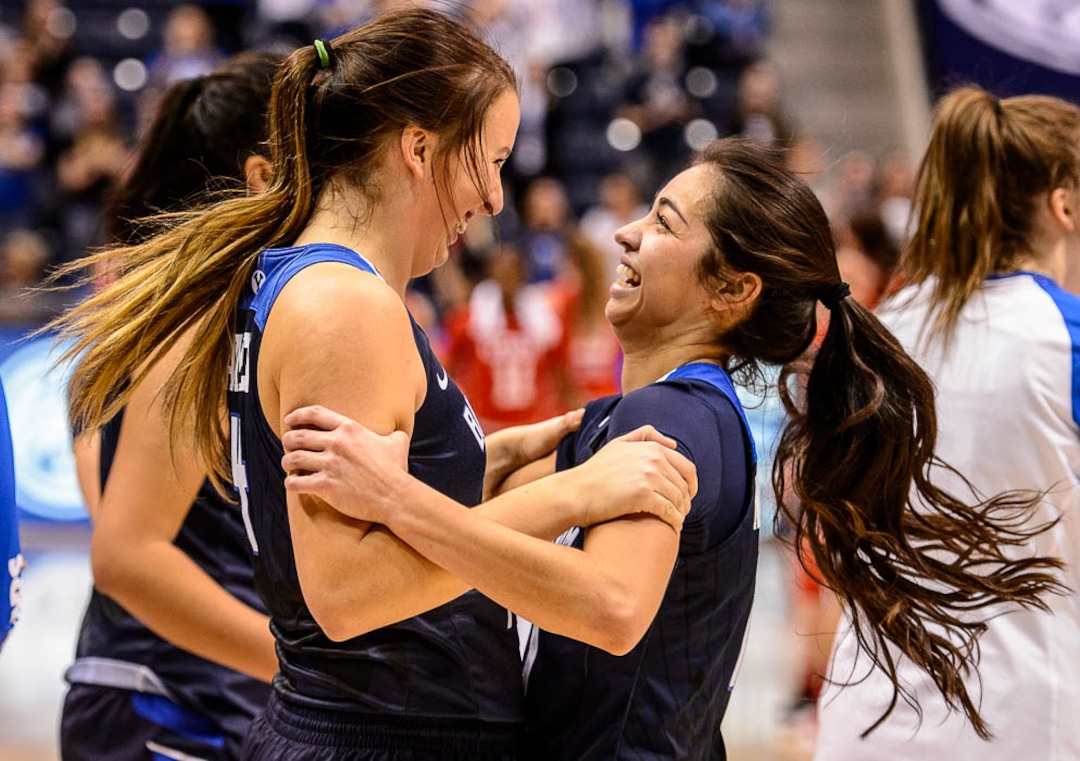 (Trent Nelson | The Salt Lake Tribune)  Brigham Young Cougars forward Amanda Wayment (4) and Brigham Young Cougars forward Malia Nawahine (10) celebrate the win as BYU hosts Utah, NCAA women's basketball in Provo, Saturday December 9, 2017.