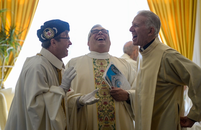 Francisco Kjolseth | The Salt Lake Tribune

Sir Michael Feeley, Monsignor Joseph Mayo and pastor Robert Bussen of Christ the King parish in Cedar City, from left, share a laugh in the Bishop Glass Room during the vesting prior to the installation of Bishop Oscar A. Solis as the 10th bishop of the Diocese of Salt Lake City takes place at the Cathedral of the Madeleine on Tuesday, March 7, 2017.

