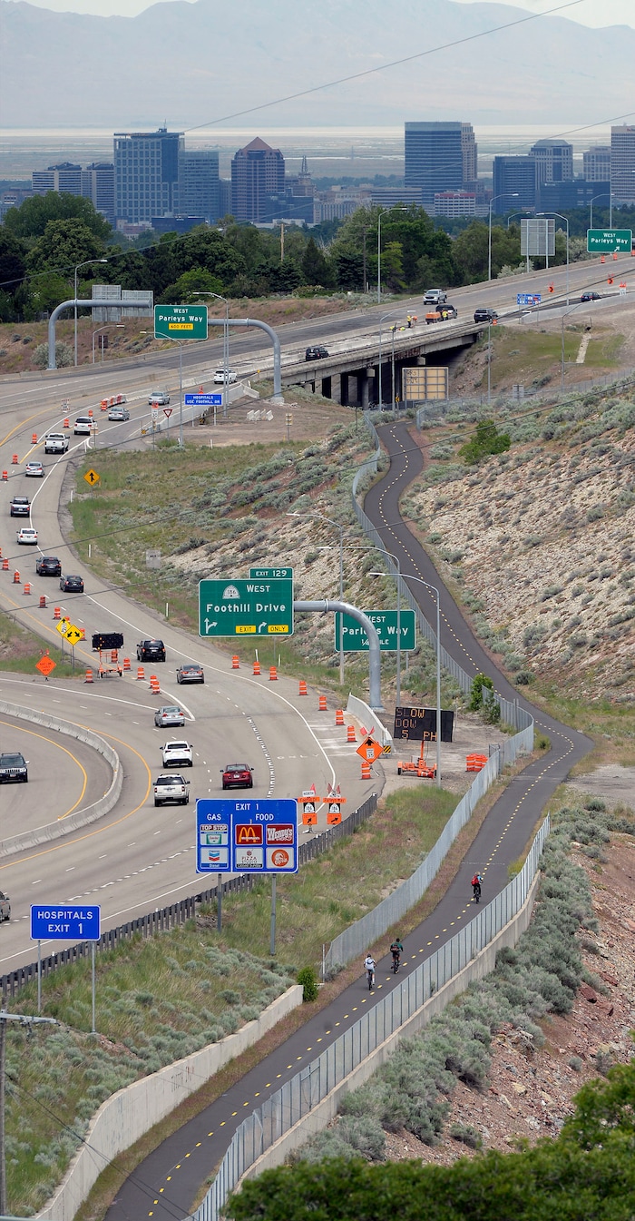 (Al Hartmann | The Salt LakeTribune) Bicyclists on Parley's Trail next to I-80 at Foothill Drive are pictured in this file photo.
