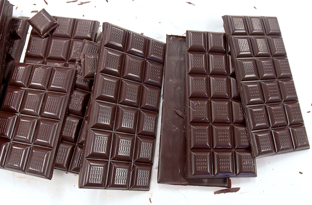 (Eli Lucero  |  The Herald Journal) Chocolate bars sit on a table at the Aggie Chocolate Factory on Tuesday in Logan.