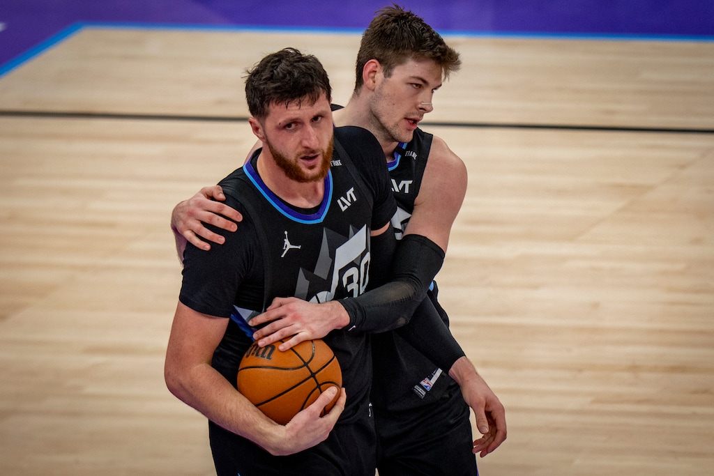 (Rick Egan | The Salt Lake Tribune )Utah Jazz forward Kyle Filipowski (22) hugs Jazz center Jusuf Nurkic (30) after a big play in the final minutes of game earlier this season.
