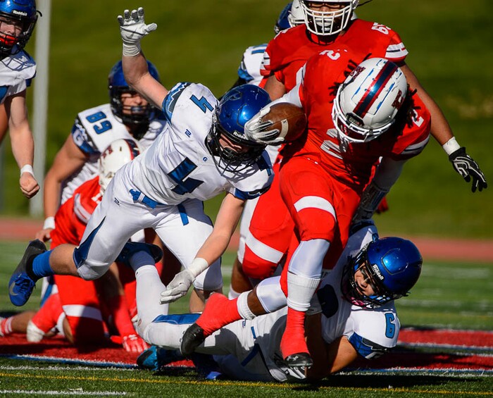 (Trent Nelson | The Salt Lake Tribune)
East's Tutu Spann (2) breaks free on a run as East hosts Pleasant Grove in the first round of the 6A high school football playoffs, Friday Oct. 26, 2018.