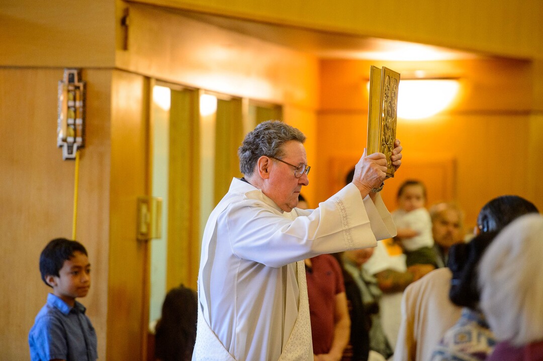 (Trent Nelson  |  The Salt Lake Tribune)  Deacon George Sluga at Easter Mass at Saints Peter & Paul Catholic Church in West Valley City on Sunday April 21, 2019.