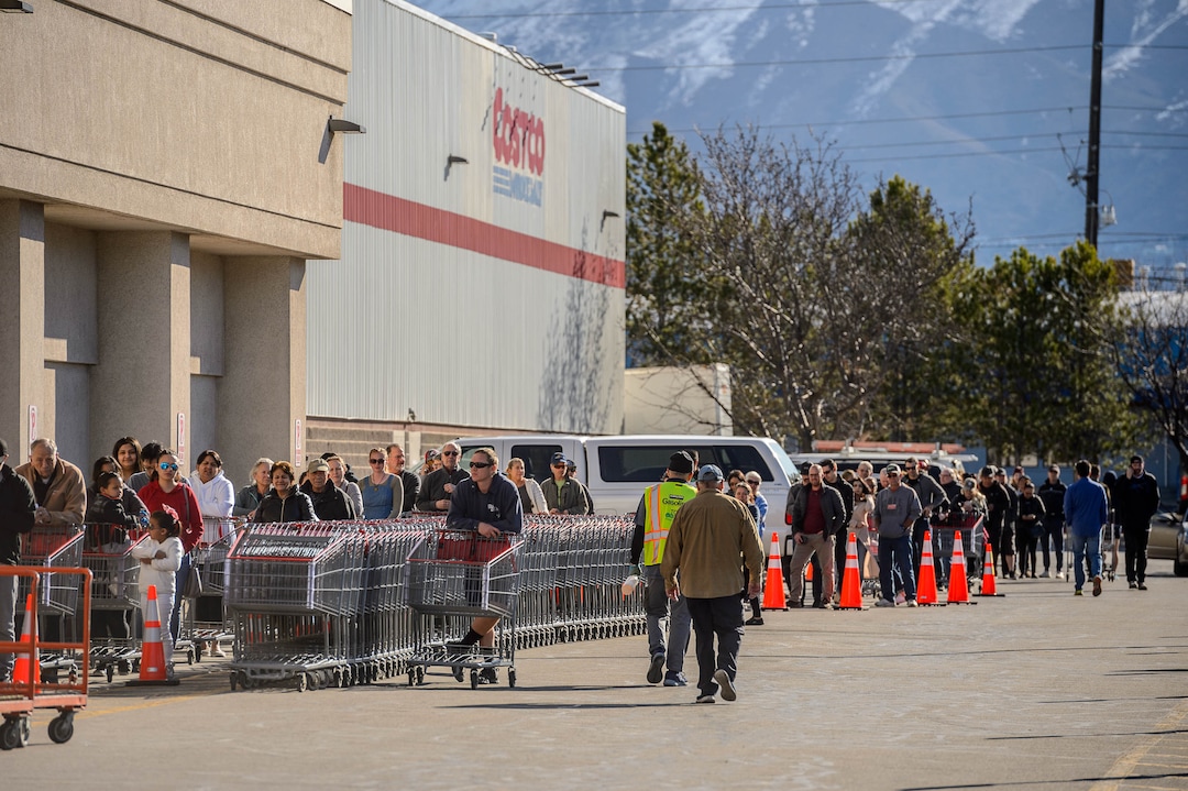 (Trent Nelson  |  The Salt Lake Tribune) Shoppers in line at the Salt Lake City Costco location on Monday, March 16, 2020.