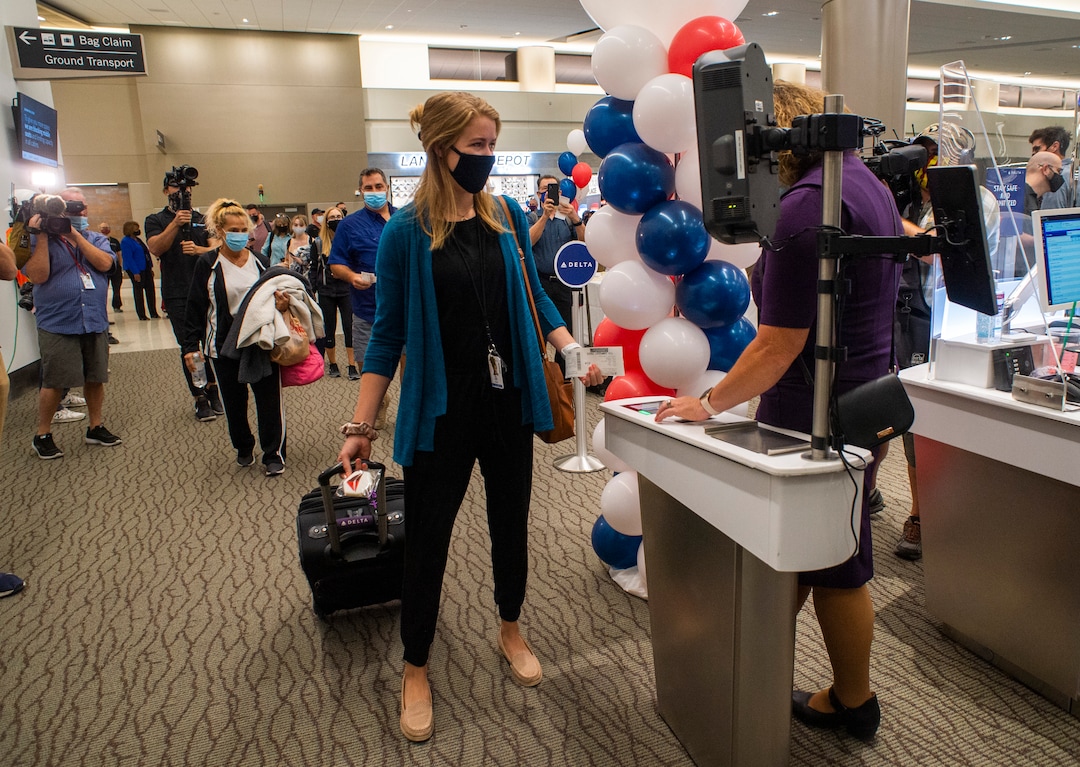 (Rick Egan  |  The Salt Lake Tribune)     Passengers board Delta Flight 2020, the first flight out of the new terminal at the Salt Lake City International Airport on Tuesday, Sept. 15, 2020.
