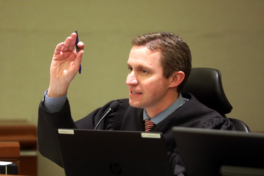 Judge James D. Gardner hears arguments in Third District Court Thursday Nov. 15, 2018, in West Jordan, Utah. Gardner, Utah judge has reserved a decision on a lawsuit in a tight House race filed by a Republican incumbent who is seeking to halt vote counting in a Democratic-leaning county that's key to the outcome. Gardner heard arguments in the lawsuit filed by U.S. Rep Mia Love, but ended the hearing without making a ruling. (AP Photo/Rick Bowmer, Pool)